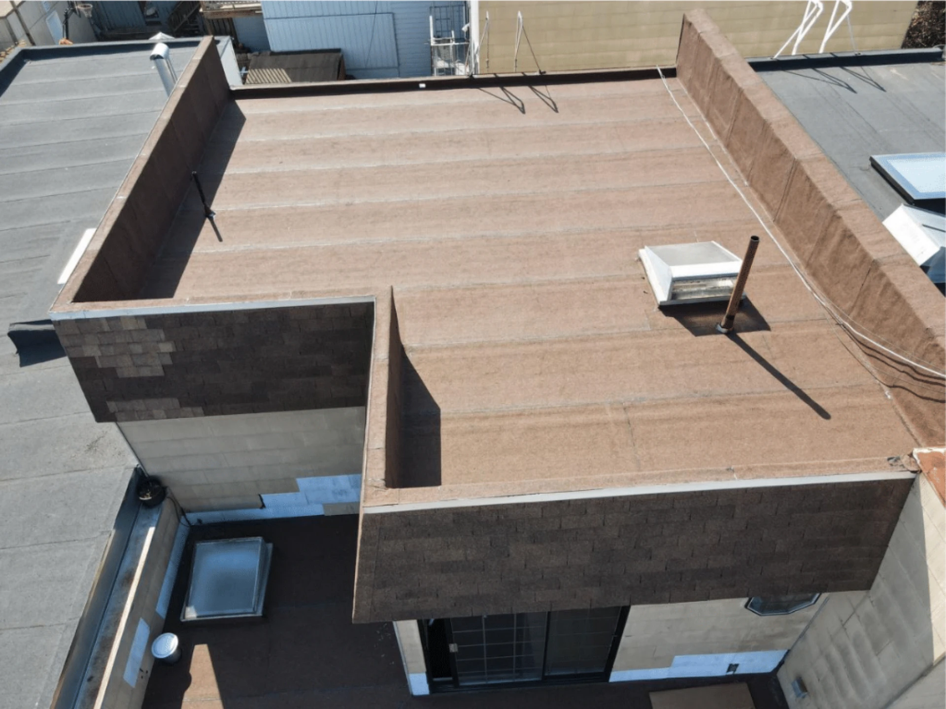 Designing Effective Drainage for Flat Roof Replacement in San Francisco Homes